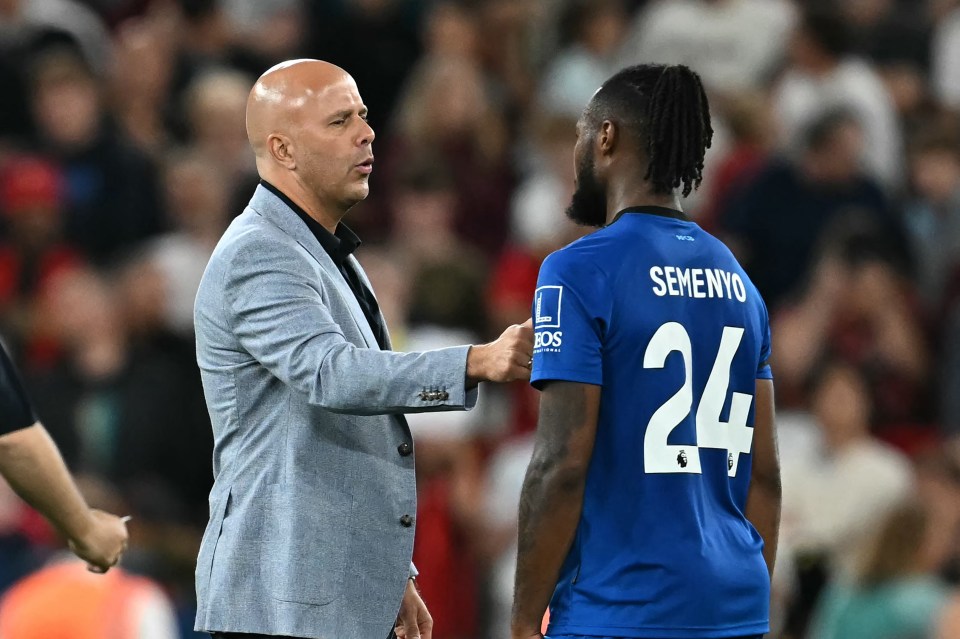Coach speaking to player Semenyo.