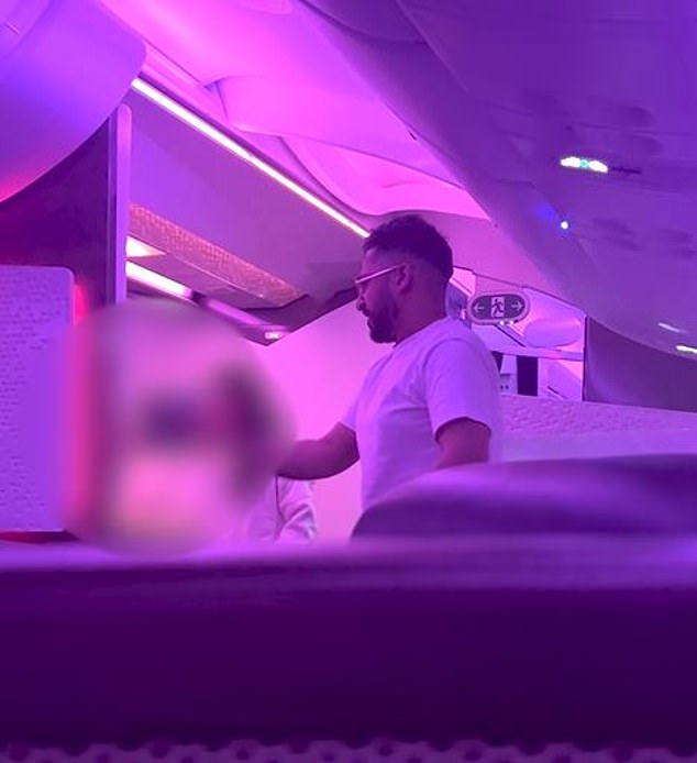 A still from a viral video showing Iftikar verbally attacking a flight attendant