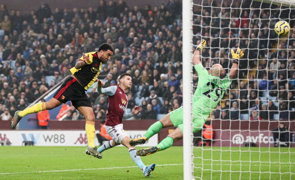 Photo of Troy Deeney scoring a goal for Watford against Aston Villa.