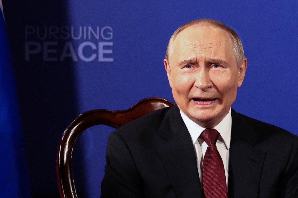 Vladimir Putin speaking at a meeting.