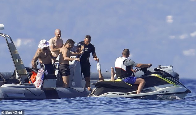 Macron wore only black swimming shorts aboard a yacht with wife Brigitte, 72, and their friends near Fort de Bregancon on Thursday