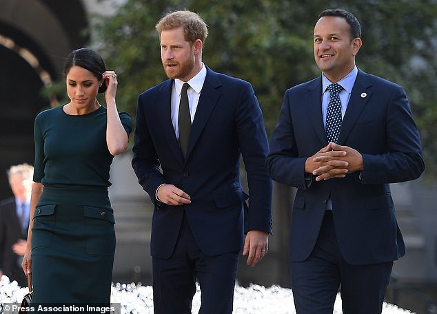 The expert says that Harry's body language suggests that he is happy to be steered