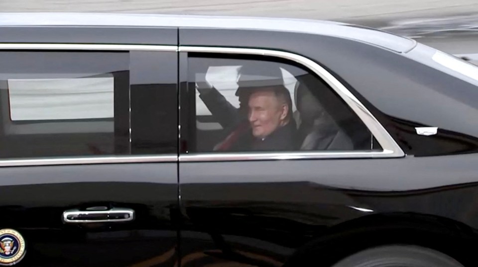 Presidents Trump and Putin in a car.