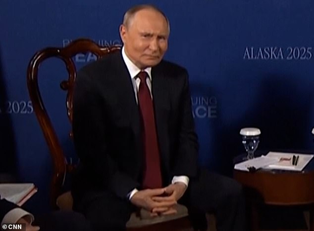 Putin appeared to make a confused expression as multiple journalists bombarded the two with questions