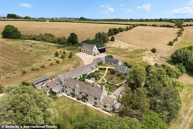 High end estate agent Sotheby's International Realty is marketing the seven-bedroomed home as 'a landmark country estate in the heart of the Cotswolds'