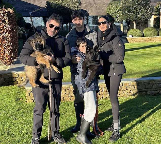 Simon Cowell - pictured here in an Instagram photo he shared alongside his fiancee Lauren Silverman and their sons Eric, 10, and Adam, 18 - is bidding to build a new extension