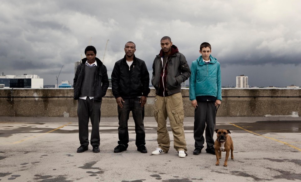 Cast of Top Boy on a rooftop.