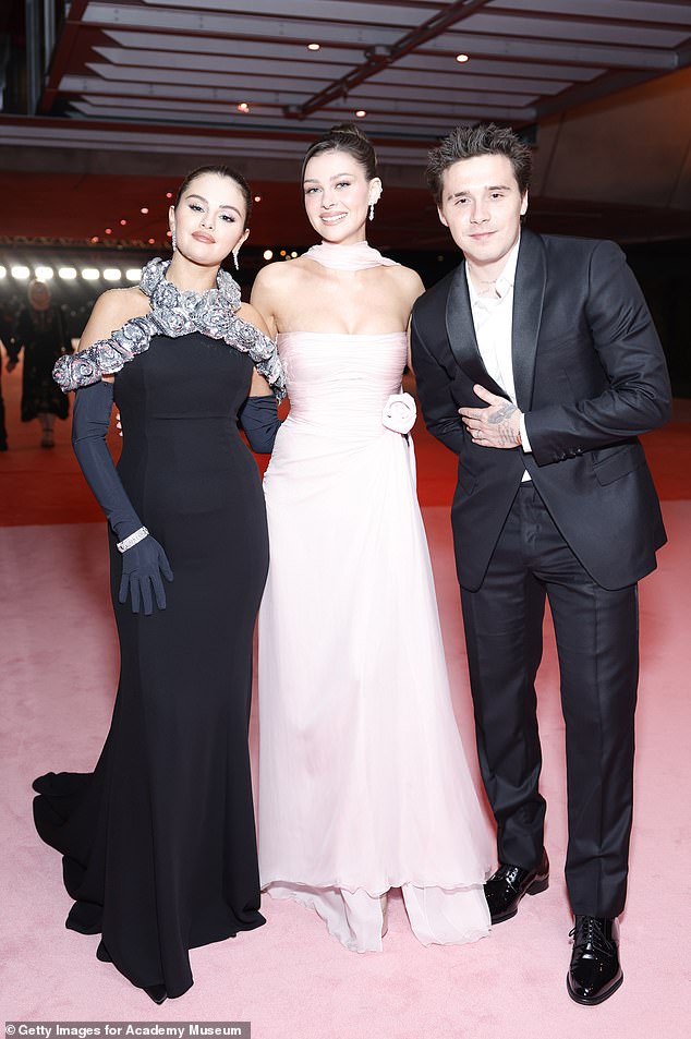 The trio formed an incredibly close bond over the past few years, with the singer cementing their closeness when she joked they were in 'throuple' back in 2023 (pictured 2023)