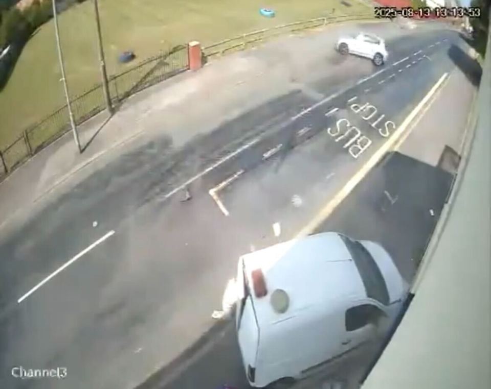 Security camera footage of a car hitting a pedestrian.