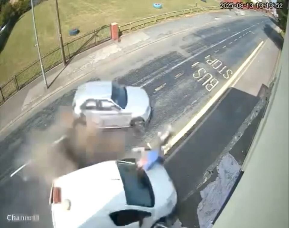Security camera footage of a car crash.