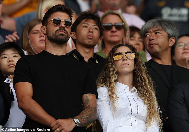 Cardoso watches on as a tribtue is paid to her late husband before Wolves faced Man City