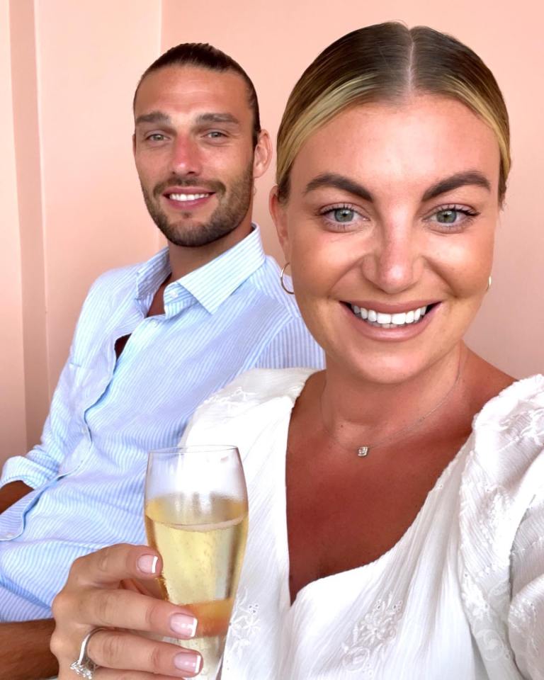 Andy Carroll and Billi Mucklow with a glass of champagne.