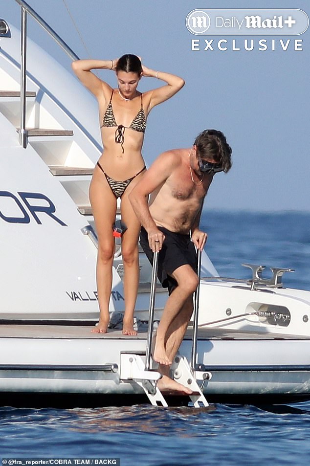 The Oscar winner was shirtless aboard a sun-soaked yacht in Formentera, flaunting a slightly slimmed-down dad bod as he tried to keep up with Vittoria¿s flawless bikini-clad figure¿proving he¿s still game for a little high-stakes romance at 50