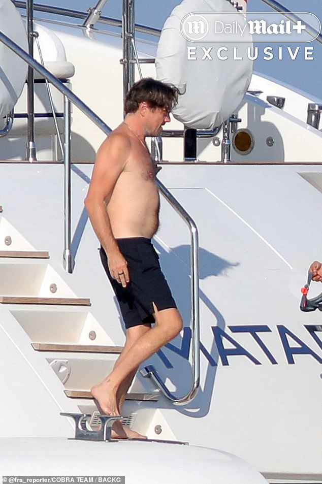 Leonardo looked every bit the leading man as he lounged shirtless on deck