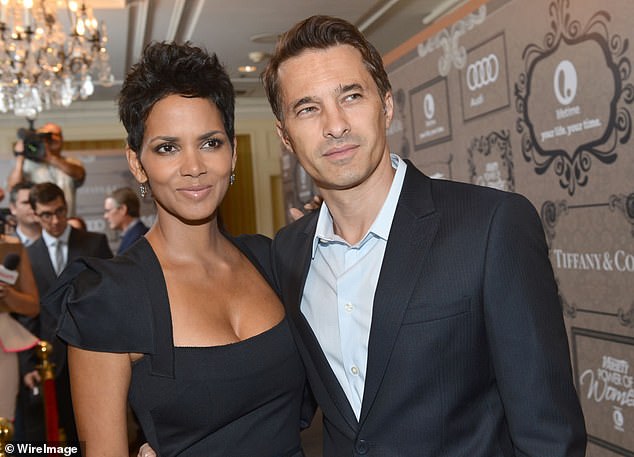 The actor, 59, who is best know for his roles in the films Unfaithful and S.W.A.T., had his fair share of success in the industry (pictured with ex wife Halle Berry in 2012)