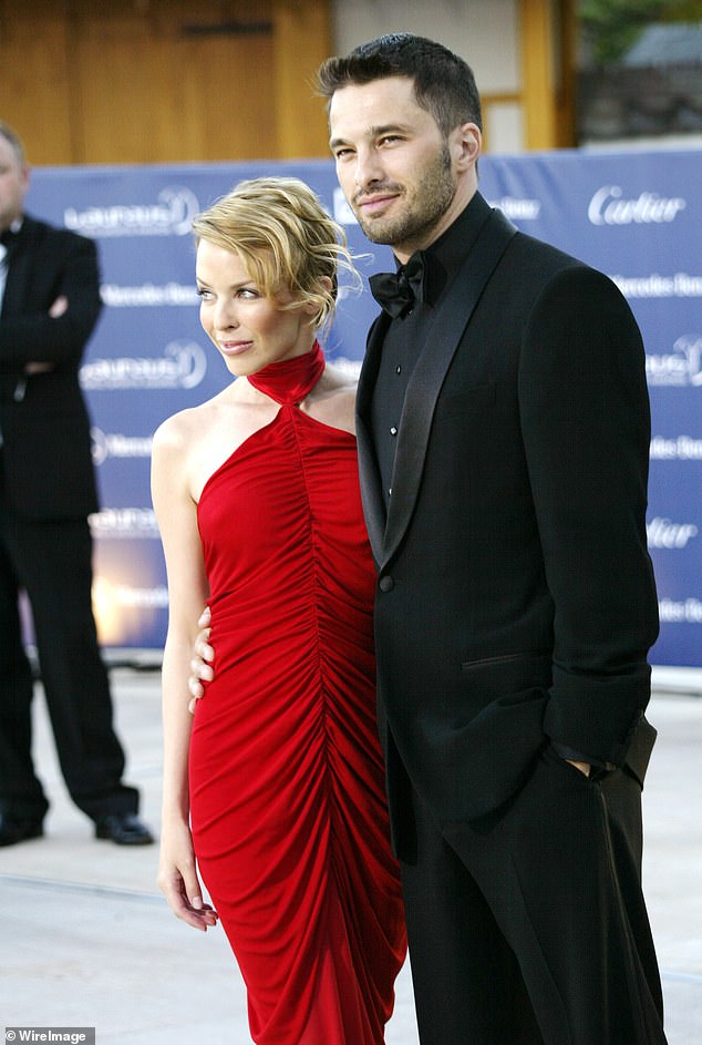 Olivier also famously dated Kylie Minogue from 2003 to 2007 after he met her at the Grammy Awards. The couple split amid infidelity rumours which they denied (pictured in 2003)