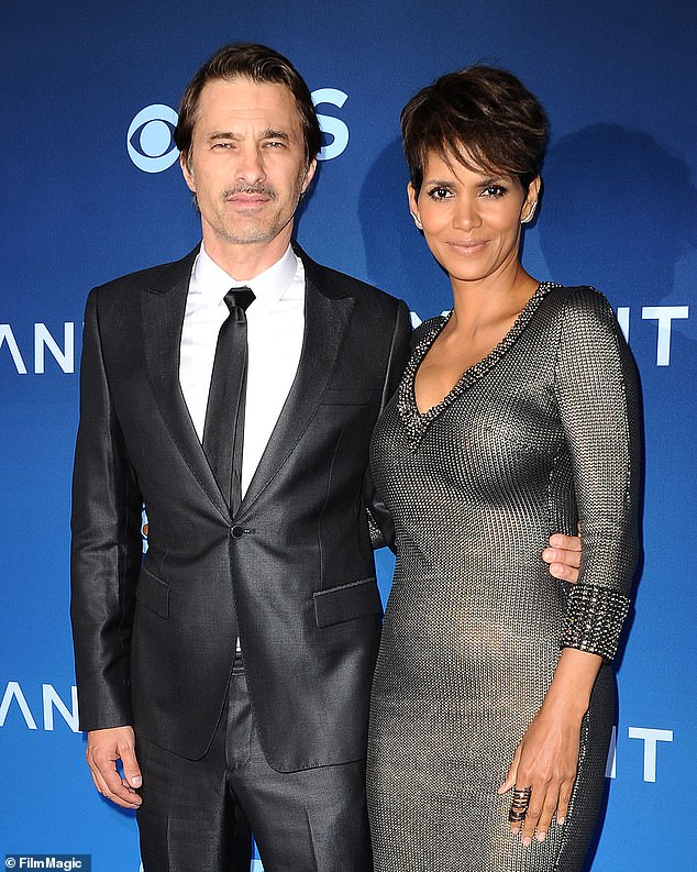 Olivier and Halle wed in 2013 - the same year they welcomed their son Maceo, 11 - and split in 2016. The couple's divorce was finalised in 2023 (pictured in 2014)