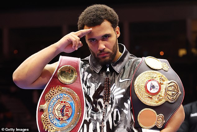 Itauma poses after retaining his WBA and WBO Intercontinental belts (though he would have either way)