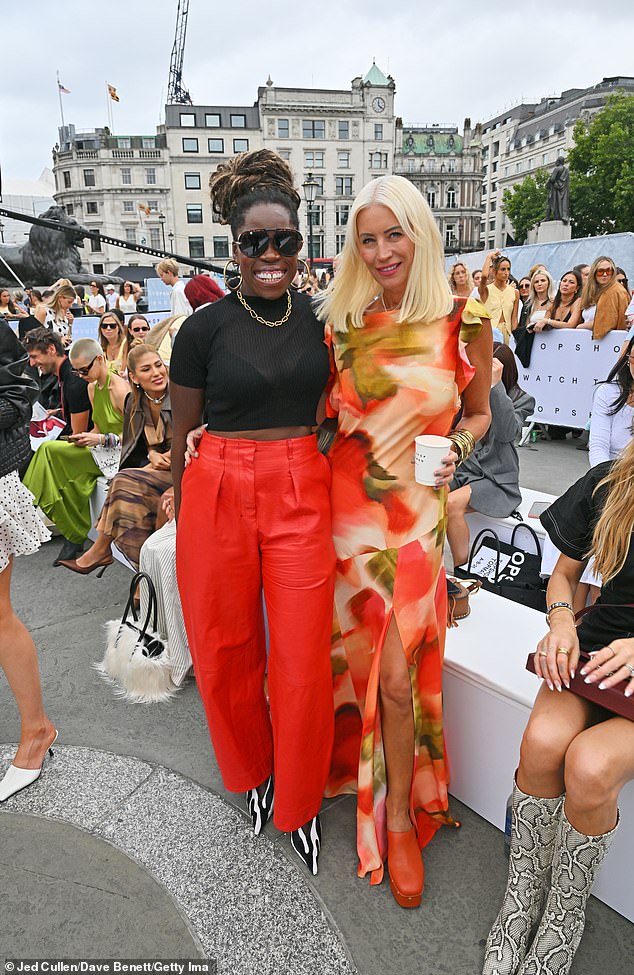 She paired her summery look with a pair of orange platform shoes as she finished her ensemble with a pair of matching tinted sunglasses (pictured with fashion editor) Nana Acheampong)