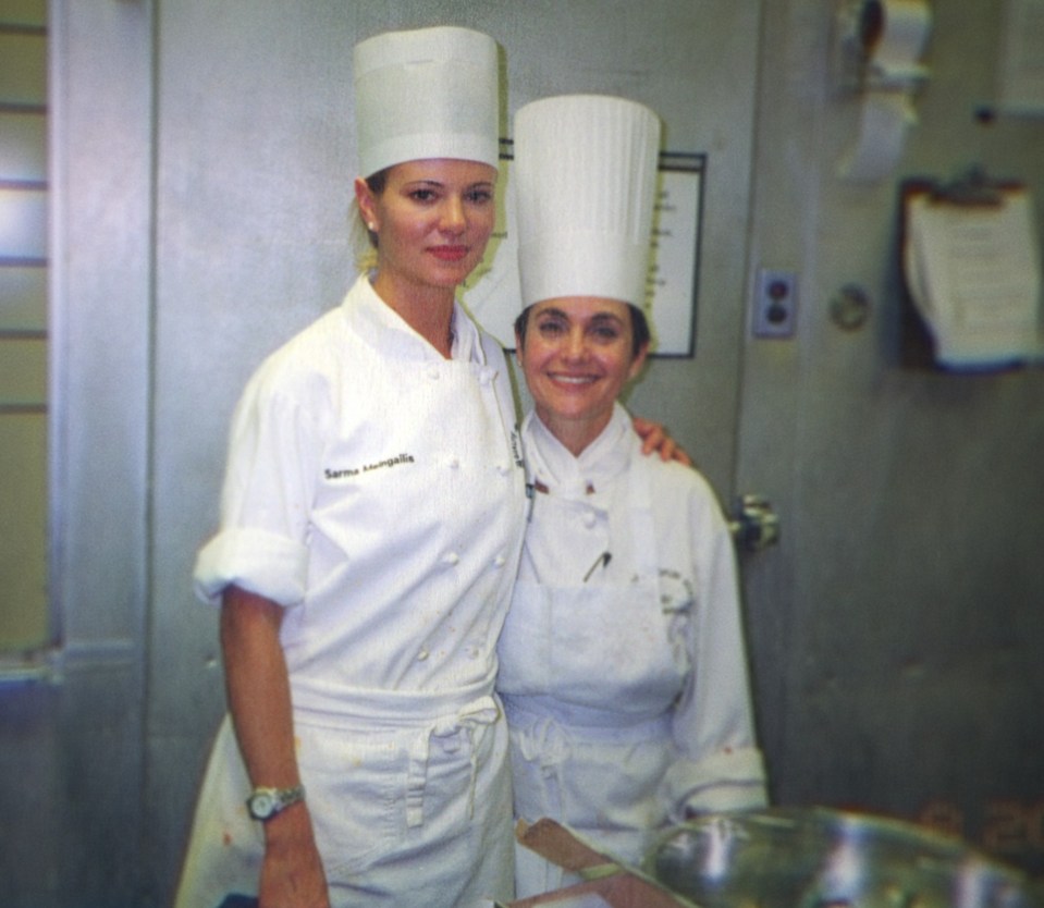 Photo of two women in chef's uniforms.
