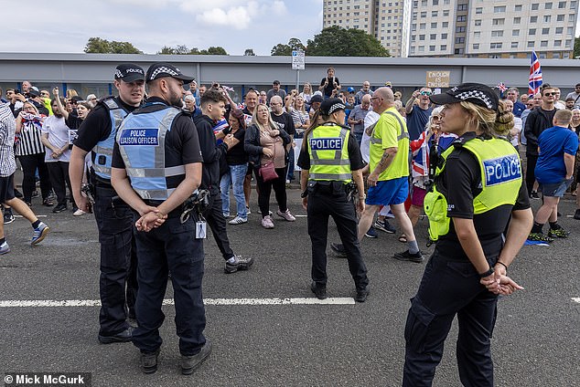 A large police presence separated two rival protests from those opposed to the asylum hotel and anti-racist demonstrators