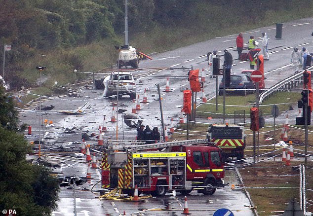 Emergency services are pictured on the scene of the tragedy which happened in August 2015 when a vintage fighter jet crashed on to the A27 in West Sussex