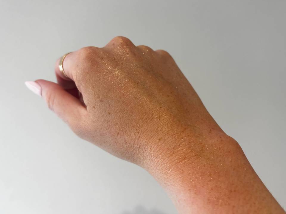 Hand with body shimmer.