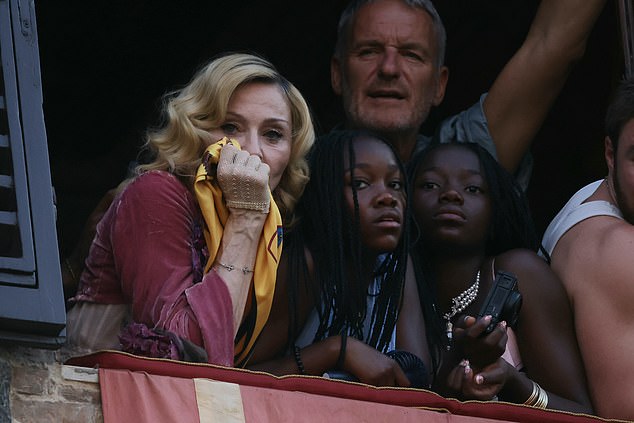 Madonna looked nervous at one point during the race