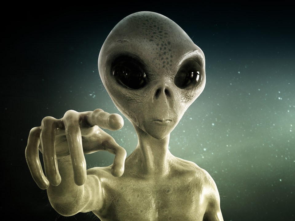Illustration of an alien pointing.