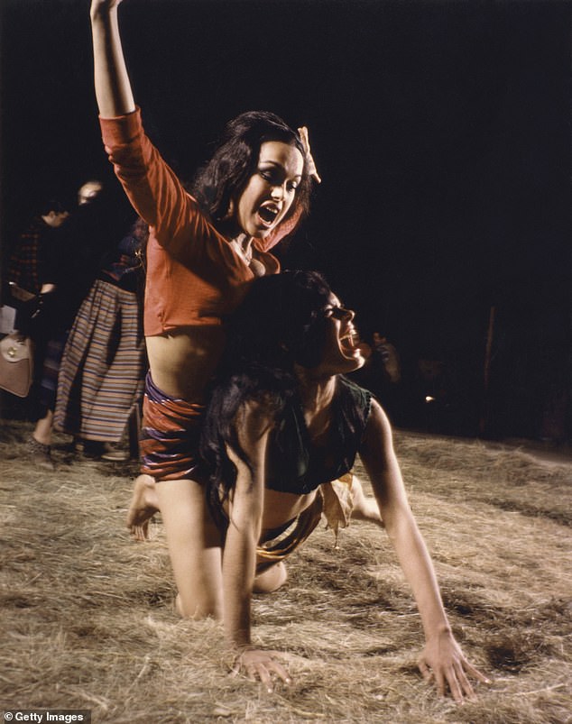 She was 23 years old at the time she played the brunette bombshell wearing green fighting another woman over the same man. Vida competes with Zora ¿ Martine Beswick plays the woman wearing red ¿ to determine who will marry the chief's son