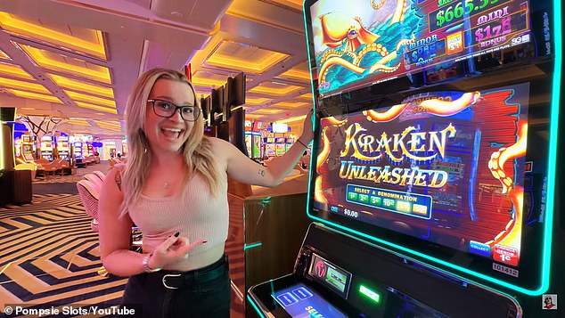 A file photo of a woman playing a slot machine at Resorts World in Las Vegas