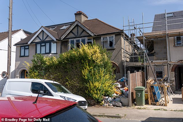 Locals in St Albans, Hertfordshire, said their 80-year-old neighbour Roger, who wades through the noxious waste to leave his home just once a day, has refused help