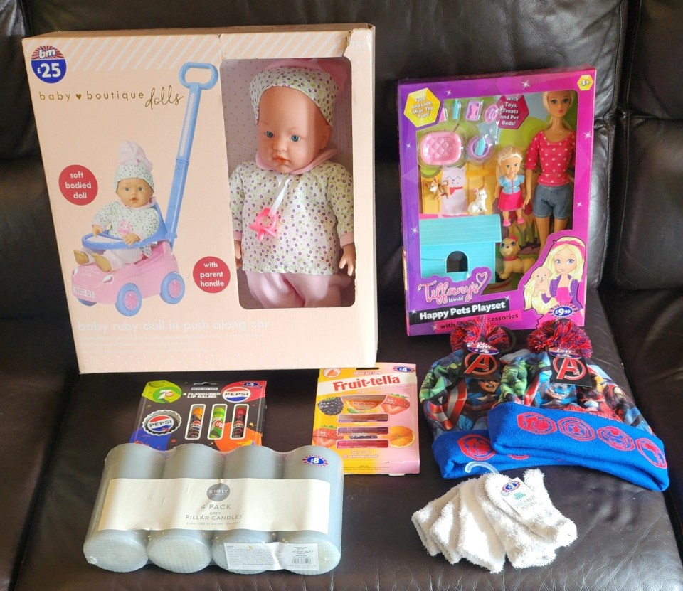 Assortment of toys, candles, and winter accessories.