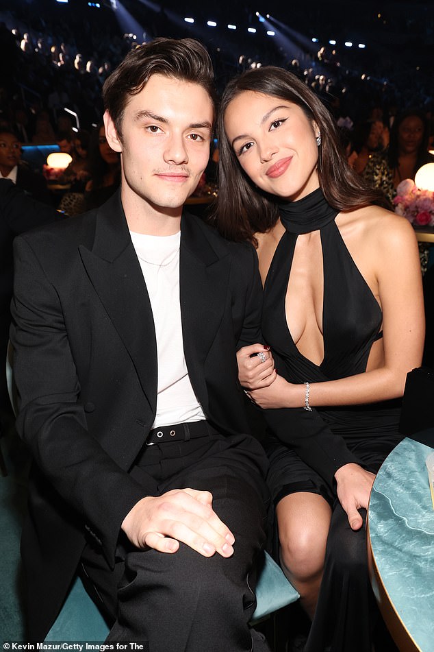 Olivia and English actor Louis, both 22, may have reached a major new milestone in their romance after two years of dating as she stepped out with a diamond ring on her ring finger