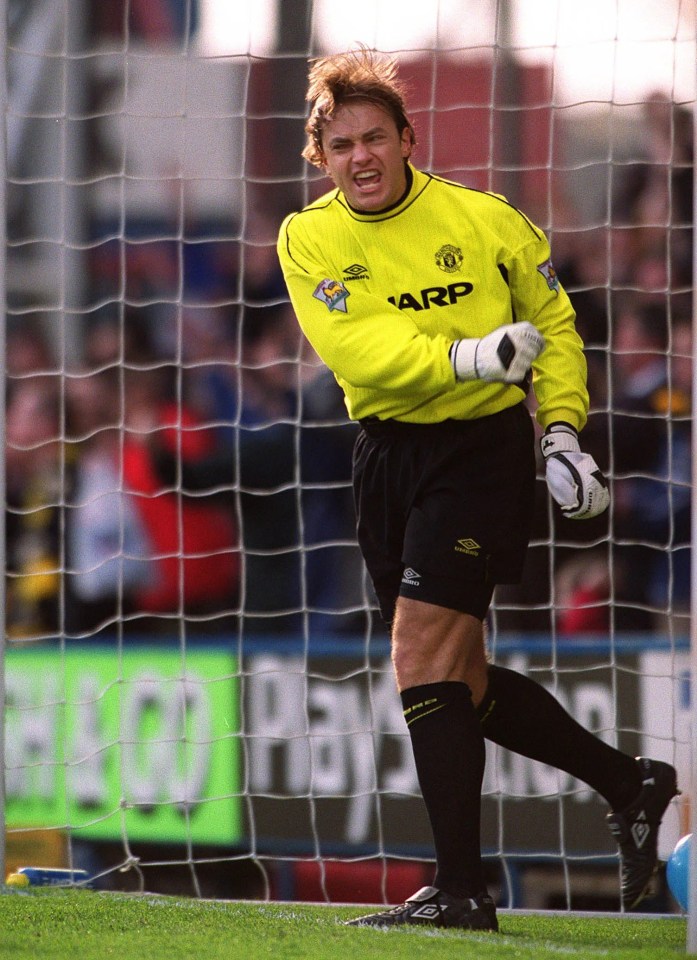 Mark Bosnich reacting angrily after a goal.