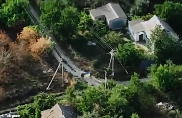 The footage is then paraded on kremlin television as evidence of Moscow 's unstoppable advance in the Donetsk region - even though the villages remain firmly under Ukrainian control