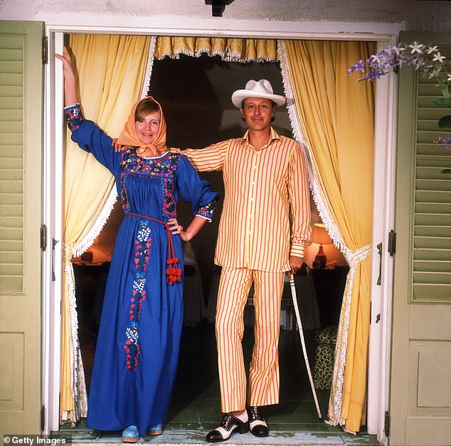 Lady Glenconner with her husband Colin Tennant on the island of Mustique in March 1973 - in one of his rages on the island he beat her so hard that she went deaf in one ear