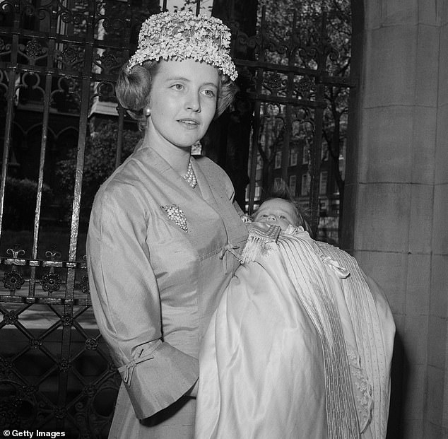Lady Glenconner's eldest son, Charles, died from hepatitis in 1996 (pictured together at his christening in 1957)