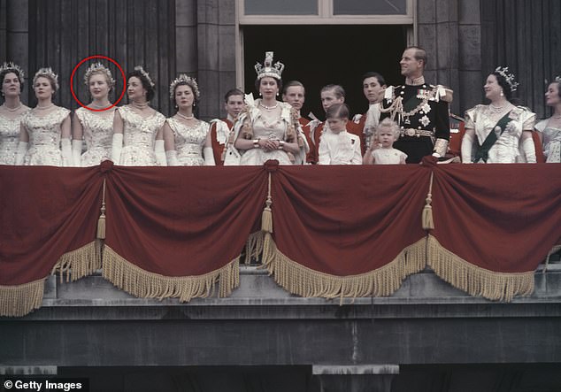 Lady Glenconner served as a maid of honour at the late Queen's Coronation in 1953. Above: She is seen third left on the Buckingham Palace balcony with the Royal Family after the Coronation service
