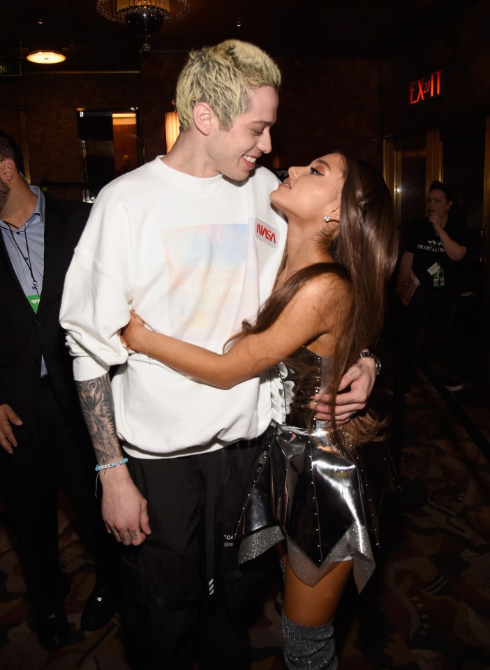 Pete Davidson and Ariana Grande embracing at the 2018 MTV Video Music Awards.