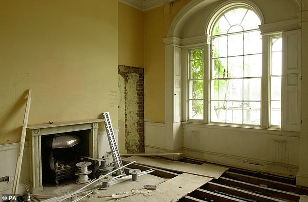 Ripped up floorboards and exposed brickwork can be seen in the front reception room of the Grade-II building once admired by both King George IV and King Edward VIII