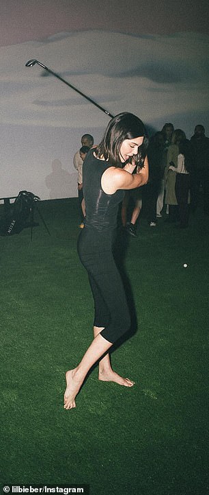 Dressed in clinging black capris and a sleeveless top, she showed off her athletic prowess