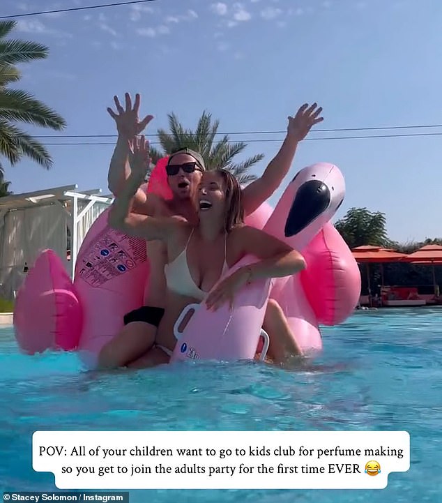 The pair couldn't stop laughing as they jumped on a large pink inflatable flamingo, before putting on a loved-up display in the pool
