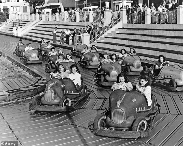 Pictured: Happy holidaymakers enjoying go carts at Dreamland in 1952
