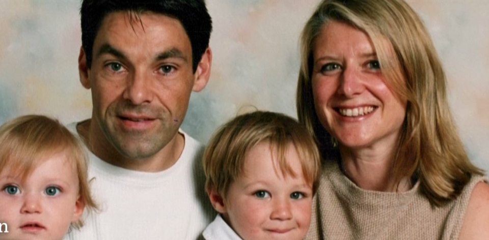 Photo of Robert Brown with his wife and two young children.
