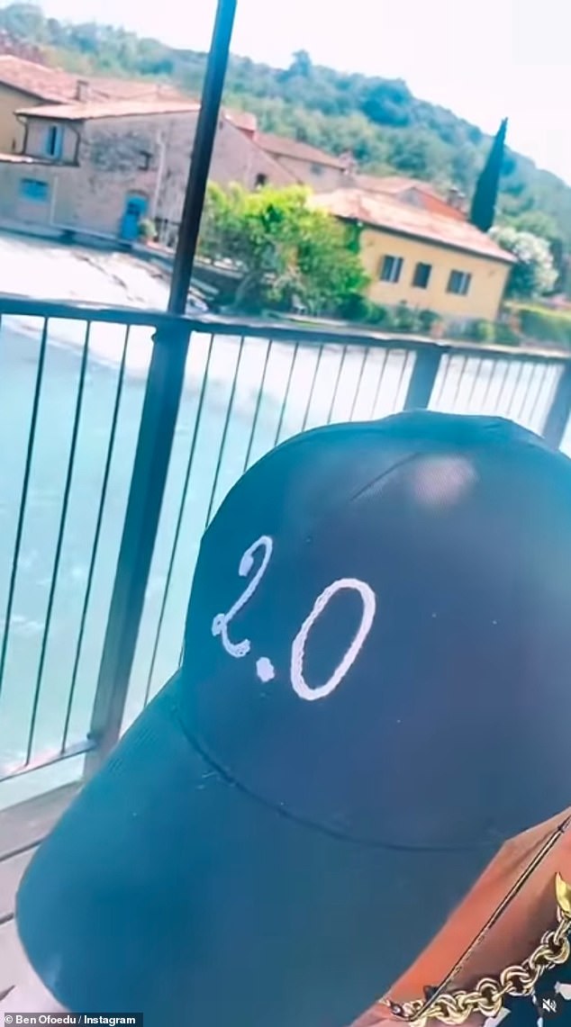 As they enjoyed a drink out Ben filmed her before turning the camera back to himself to show he was wearing a black cap with '2.0' on it
