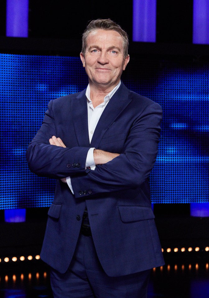 Bradley Walsh, host of The Chase, in a blue suit.