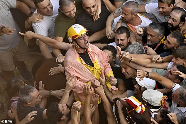 This year's Palio was won by Valdimontone, with bystanders going wild as the winning jockey crossed the line