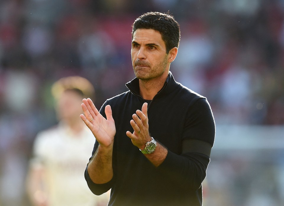 Mikel Arteta applauding after a soccer match.