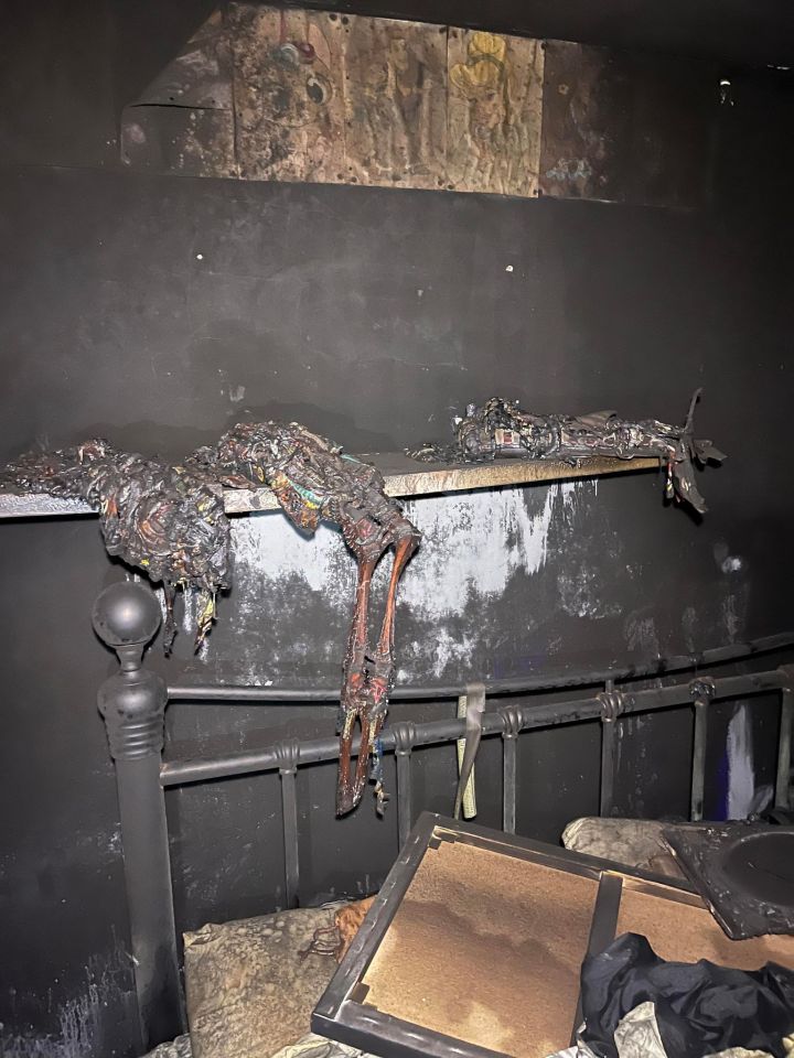 Fire-damaged bedroom after a house fire.
